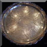 S08. Round silverplate tray. 